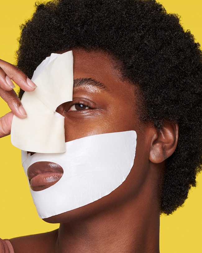 Woman applies and removes Ceramidin Barrier Mask to skin revealing moisturized skin